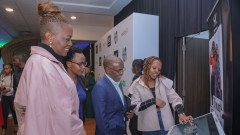 From left, Safaricom PLC, Chief Financial Services Officer, Esther Waititu Masese, Safaricom PLC, Fintech Integration Tribe Lead Juliana Rotich and Safaricom PLC CEO Peter Ndegwa pay attention and Florence Njoki of Shop Zetu. PHOTO/COURTESY